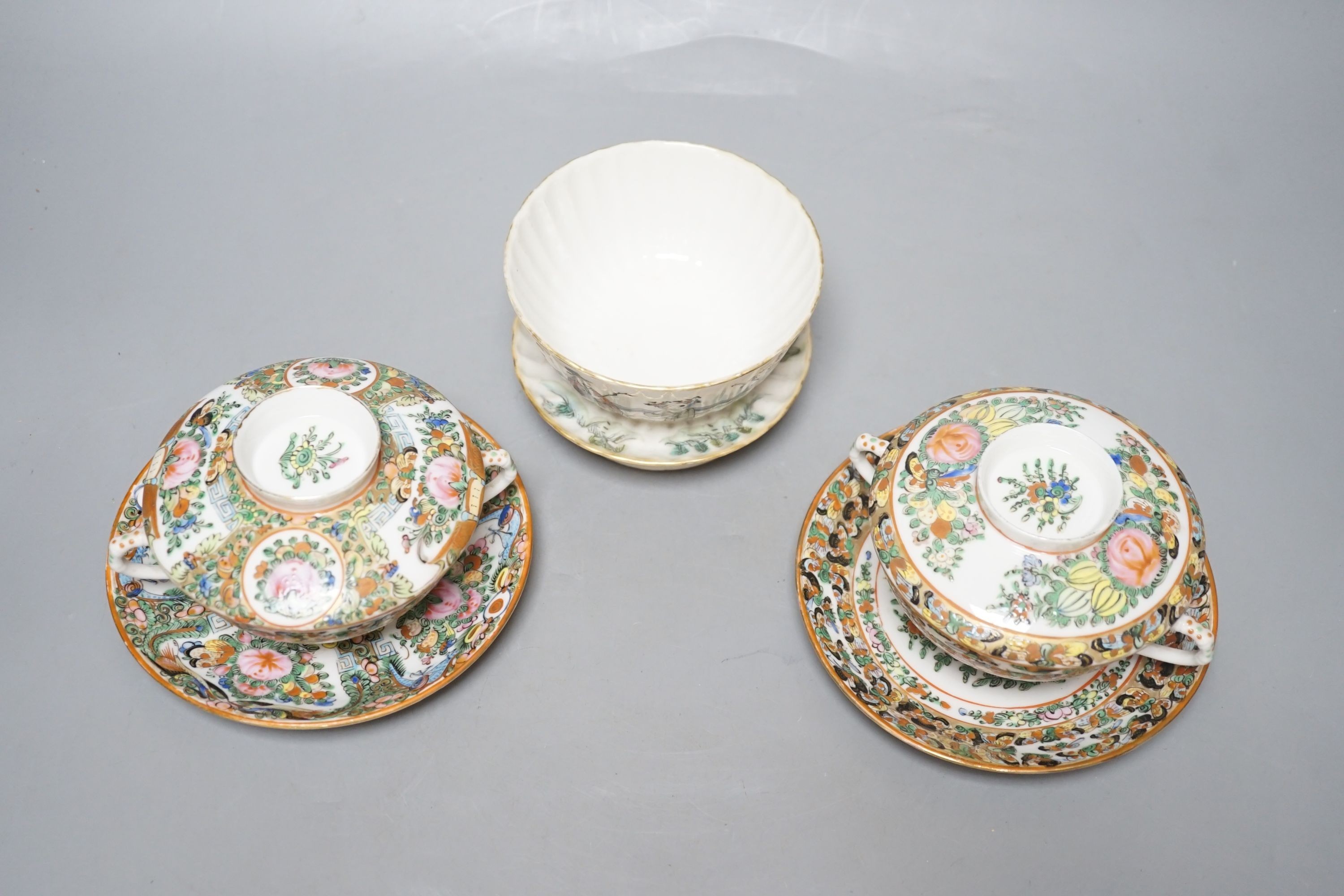 A Chinese porcelain tea bowl and stand and a pair of Cantonese bowls, covers and stands, 14cm diameter